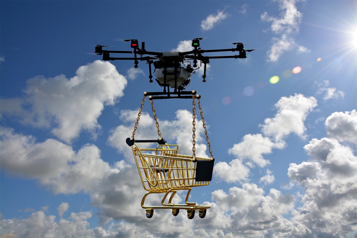 Arial drone carrying a shopping trolley